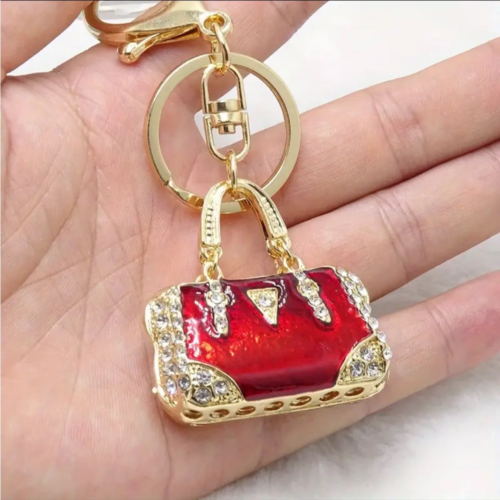 Keychain Ruby Red and crystal purse. NIP. 1.75 x 1.75 x.5” width. Length 4.25” - Picture 4 of 7